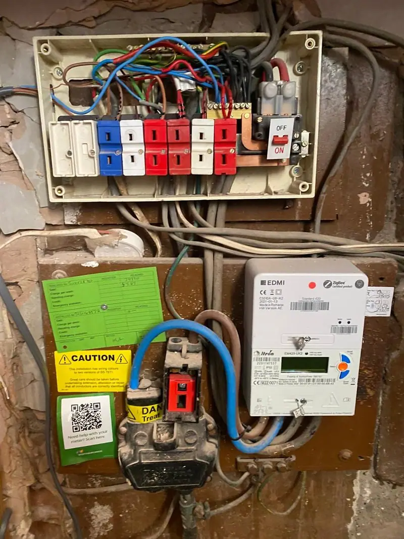 A rewireable fuse box with ceramic fuse carriers and no RCD protection